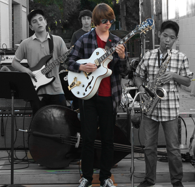 Niko Winchell Performing With Group Niko Winchell Performing